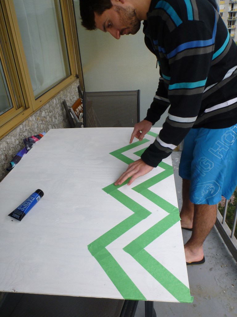 Lay down your tape. You could measure it out, but I think it's almost more fun to have it a little crooked and offbeat.